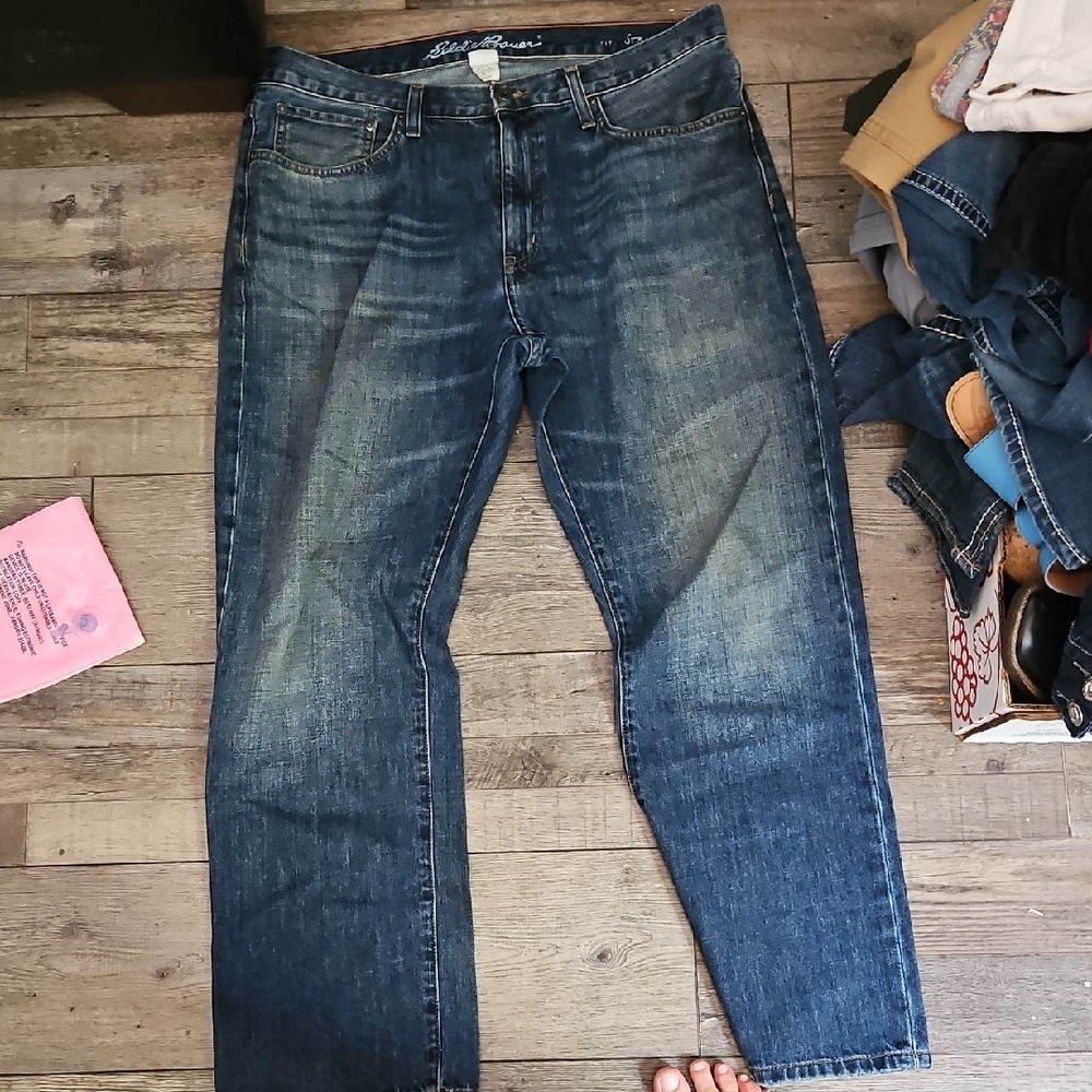 Blue Straight Leg Jeans with Vintage Wash. * Has One Small Hold By Pocket*